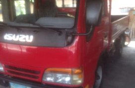 Isuzu Elf Dropside 12ft MT Red Truck For Sale 