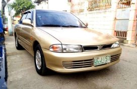 Mitsubishi Lancer GLXI 1995 AT Golden For Sale 