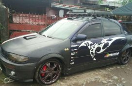 97 Mazda 323 Familia Generation 25 RayBan for sale