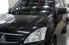 2009 Mitsubishi Fuzion black for sale