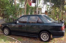 Mazda 323 1996 Manual Green Sedan For Sale 