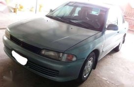 For sale car: Mitsubishi Lancer Sedan 4-door car 1996