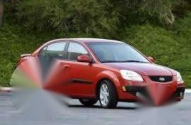 Kia Rio Automatic Signal Red 2010 for sale 
