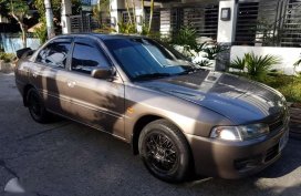 Mitsubishi Lancer Pizza 1997 Brown For Sale 