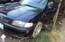 Fresh Mazda 323 Loaded Aircon Black For Sale 