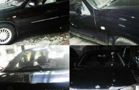 For sale Nissan Exalta black year model 2005.