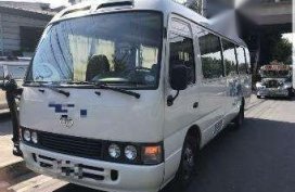 Toyota Coaster 2015  30 seater White For Sale 