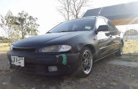 Mazda 323 Familia Sale or swap sa ibang kotse or motor plus cash