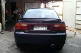Fresh Mazda 323 1998 model AT Blue For Sale 