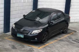Toyota Corolla Altis 1.6V 2010 AT Black For Sale 