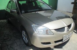 Well-maintained Mitsubishi Lancer 2006 GLX MT for sale
