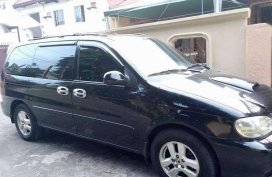 kia grand carnival 2002 blackvan for sale 