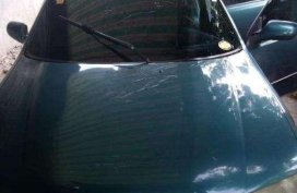 mazda 323 1997 Green sedan for sale 