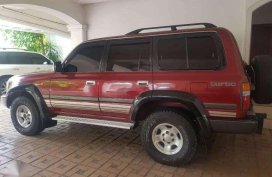 SELLING red 1997 Toyota Land Cruiser 80