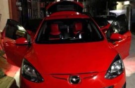 For sale Mazda 2 red hatch back Model 2011