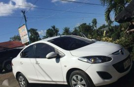 Mazda 2 Sedan white (slightly used) 2014 model