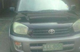 Toyota RAV4 year model 2001 color black 
