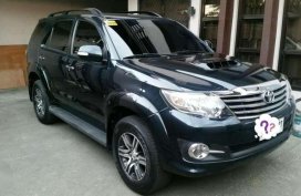 TOYOTA Fortuner G AT 2015 model smells new good as new