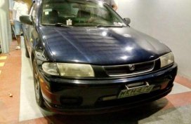 Mazda Familia 323 (Gen 2.5) 2000 model