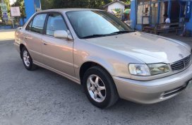 Selling my Toyota COROLLA gli baby altis 2000 model