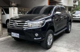 Selling Toyota hilux 4x2 G Automatic diesel Black 2016
