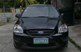 Black Kia Carens 2009 for sale 
