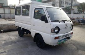 Selling Suzuki Multi-Cab 2010 Manual Gasoline at 100000 km in Quezon City
