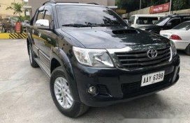Selling Black 2014 Toyota Hilux at 100000 km 