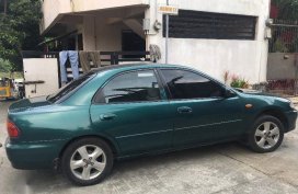 Selling Mazda 323 1997 Manual Gasoline in Meycauayan