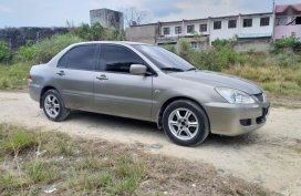 Selling 2004 Mitsubishi Lancer for sale in Consolacion