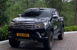 Sell Black 2016 Toyota Hilux in Quezon City