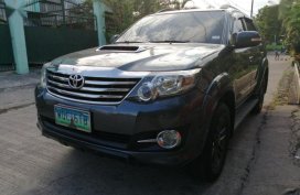 Selling Black Toyota Fortuner 2014 Automatic Diesel in Las Piñas