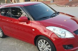 Selling Red Suzuki Swift 2014 Manual Gasoline in Trece Martires