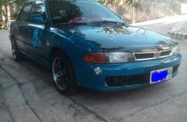 Selling Blue Mitsubishi Lancer 1995 at 161219 km in Quezon City