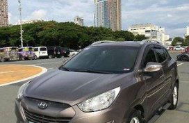 Selling Brown Hyundai Tucson 2011 Automatic Gasoline at 83000 km in Quezon City