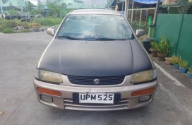 Selling 1997 Mazda 2 Sedan for sale in Lipa