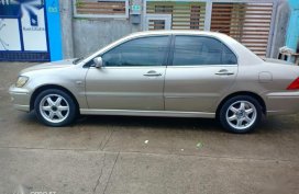 Selling Mitsubishi Lancer 2003 Automatic Gasoline in Santo Tomas