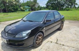 Selling Mitsubishi Lancer 2011 Manual Gasoline in Alaminos