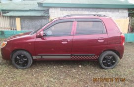 Maroon Suzuki Alto 2013 Manual for sale 