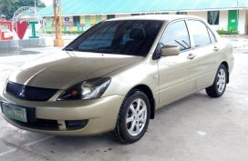Selling 2nd Hand Mitsubishi Lancer 2009 Manual Gasoline at 120000 km in Pulilan