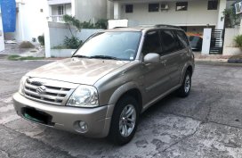 Selling Beige Suzuki Grand Vitara 2005 Automatic Gasoline in Quezon City