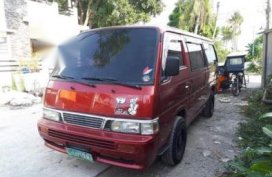 Red Nissan Urvan 2010 for sale in Pagsanjan