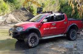 Red Mitsubishi Strada 2012 Automatic Diesel for sale 
