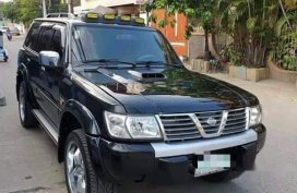 Selling Black Nissan Patrol 2002 in Malolos