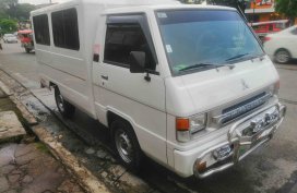 Selling White Mitsubishi L300 2008 Van in Quezon City 