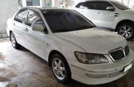 Selling 2nd Hand Mitsubishi Lancer 2004 Automatic Gasoline at 149000 km in Quezon City