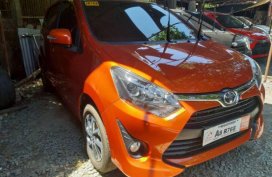Sell Orange 2019 Toyota Wigo in Quezon City
