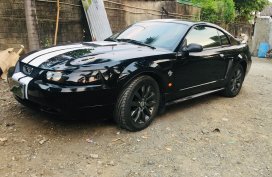Black Ford Mustang 1999 at 50000 km for sale 