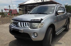 Silver Mitsubishi Strada 2007 at 98000 km for sale