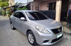 Silver Nissan Almera 2013 Sedan Manual Gasoline for sale 